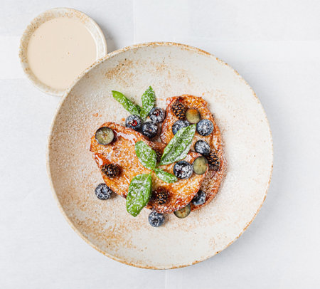 french toast wth blueberries and mintの写真素材
