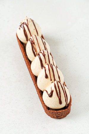 pastry with meringue on the white