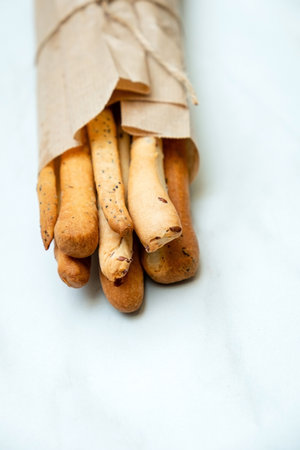 grissini with parmesan on the tableの写真素材