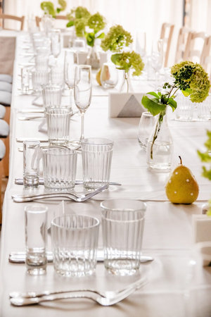 The wedding table set covered with different dishes