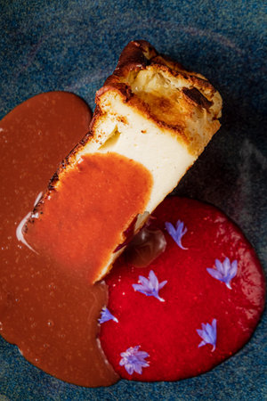 cheesecake with strawberry sauce closeup
