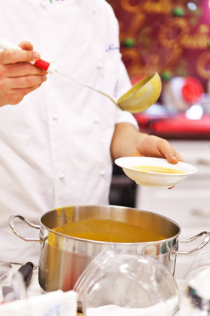 chef at work in restaurantの写真素材