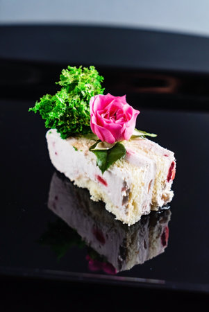 slice of birthday cake with butter creamの写真素材