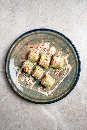 sushi set with sauce on grey background