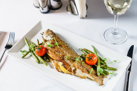 roasted trout with green beansの写真素材