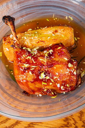 Juicy roasted chicken leg paired with tender caramelized roots, drizzled in rich savory sauce.
