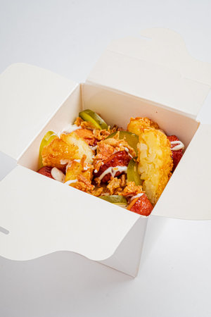 A tantalizing assortment of fried vegetables topped with crispy bits, ready for enjoyment.