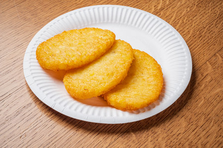 Golden potato patties on a plate promise a tasty treat for any occasion.