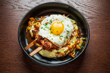 A brunch dish overflowing with flavor, served on a wooden table with vibrant colors and textures.の写真素材