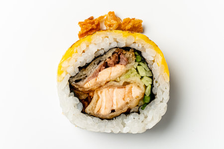 Savor a vibrant sushi roll with fresh fish, crunchy veggies, and crispy toppings!の写真素材