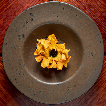 A beautifully crafted dish offers vibrant textures and bold flavors in fine dining.の写真素材