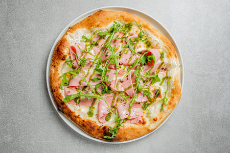 This delightful pizza showcases vibrant greens, inviting a tasty adventure.