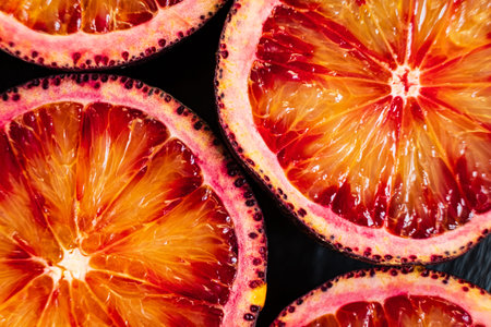 Brightly sliced blood oranges showcase their stunning color and juicy texture ready for tasting.
