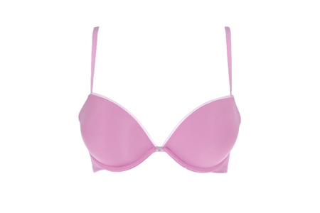 Sensual pink women's underwear. Pink female bra isolated on white.の写真素材