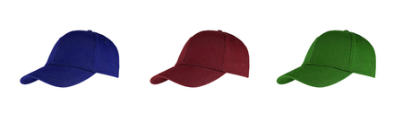 Colorful baseball hats - on a white background. Fashionable sports caps with visor.の写真素材