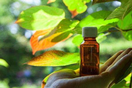 NATURAL HERBS - unconventional medicine.Bottle with herbal medicine.の写真素材