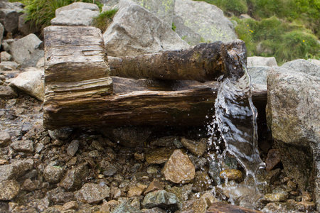 Source of spring fresh water. Near mount. Water spring in the mountains.