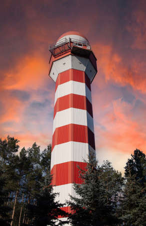 Poznan, 06 Mar 2021: Sunset view of weather station. View of Weather radar or weather station with dramatic storm sky and clouds.のeditorial素材