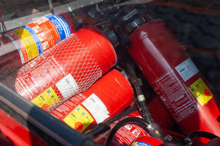 Poznan, Poland - March 26, 2021: Group Fire extinguishers in a fire truck.のeditorial素材