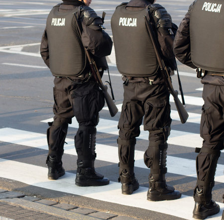 Poznan, POLAND - November 17, 2012: Armed Polish policemen keeping order during the protest.