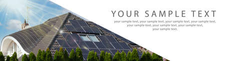 Solar PV panels on the roof of a modern house, clear sky above. Photo of a wide banner, copy space.の写真素材