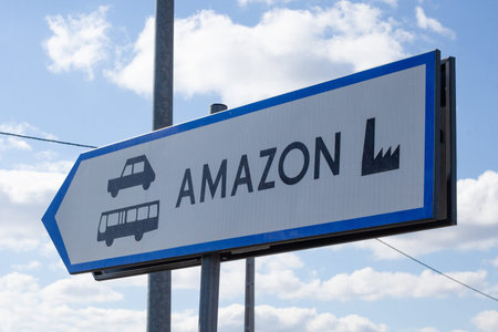 Poland, Sady - May 05, 2021: Information board in the amazon warehouse parking lot. E-COMMERCE JOB