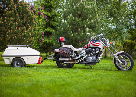 Poland, Bydgoszcz - Jun 03, 2021: HONDA Shadow VT-1100C 1988, chopper motorcycle with a caravan.のeditorial素材