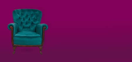 Elegance teal armchair on a maroon background. Copy space for text - banner.の写真素材