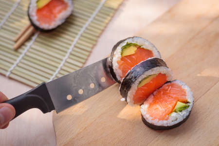 Japanese cuisine, sushi. Food making. The composition of sushi, natural light. Appetizing colors.の写真素材