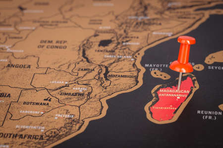 Location Madagascar, map with push pin close-up, travel and journey conceptual.の写真素材