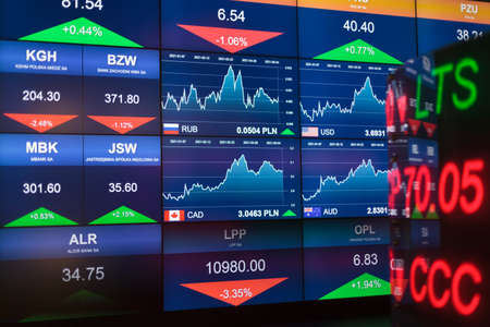 Warszawa, Poland - June 05.2021: NBP Money Center, museum. View stock quotes, display stock market information and charts using LED computer monitor.のeditorial素材