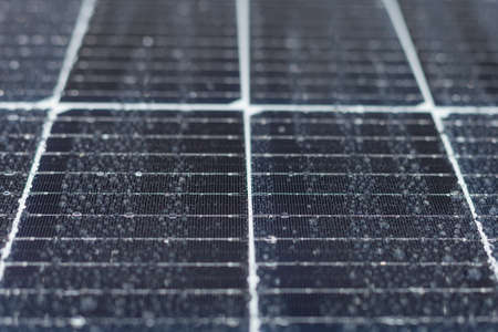 Solar panels covered with water droplets. Photo after the rainの写真素材