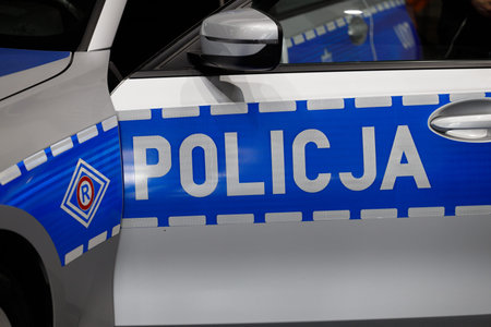 Poland, Poznan - April 08, 2022: Police inscription on a police car of the Polish police.