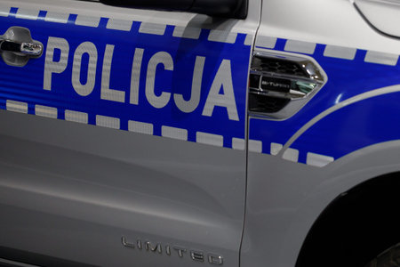 Poland, Poznan - April 08, 2022: The logo of municipal police on police car.のeditorial素材