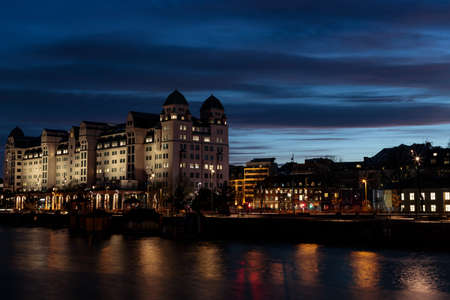 Oslo, Norway. May 02, 2021: Night photograph of the "Oslo Havnelager" building Meister is in non-Norwegian Defense Property Agency. Archives of Norwegian Intelligence Service. Constructed in 1916.のeditorial素材