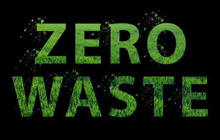 Zero waste text with green grass on black background. Inscription. Eco friendly conceptの写真素材