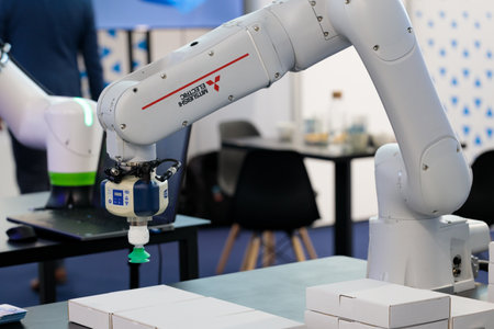 Packing automation in ITM Europe with robot arm MITSUBISHI.のeditorial素材