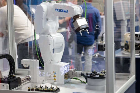 Industrial robot in tech execution, advanced automated machinery. ITM Europe, TECH EXPO. Yaskawaのeditorial素材