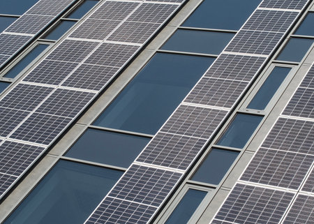 Modern Building Facade Adorned with Solar Panelsの写真素材