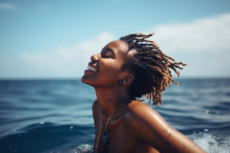 Happy Woman with Dreadlocks Enjoying Ocean Swimの素材