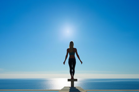 Contemplative Woman at Sunrise Overlooking the Oceanの素材