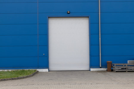 Industrial Shutter Door on Blue Wall