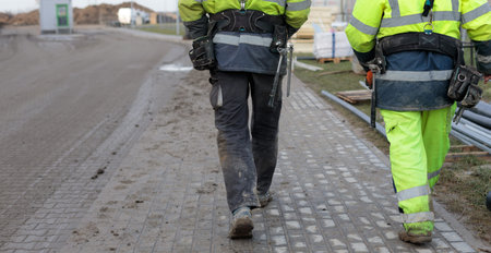 Construction Workers Walking on Site