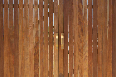 Modern wooden Gate with wooden Handlesの写真素材