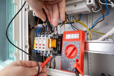 Technician Holding Probes for Circuit Testing with Multimeter