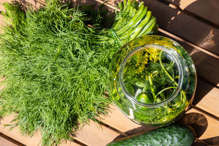 Pickling Cucumbers Dill On Wooden Tableの写真素材