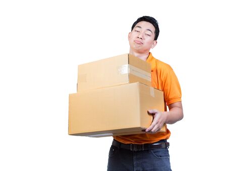 man working hand tired face moving package box delivery transpotation conceptの写真素材