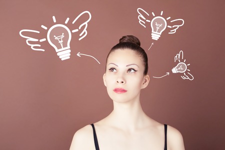 Business idea lamp girlの写真素材