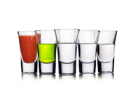 Set of alcoholic cocktail in a shot glassesの写真素材