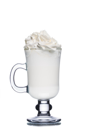 Milk cocktail in glass decorated with whipped creamの写真素材